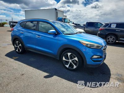 Czwarte zdjęcie samochodu z boku: 2016 HYUNDAI TUCSON LIMITED VIN:KM8J33A20GU089838 - miniatura