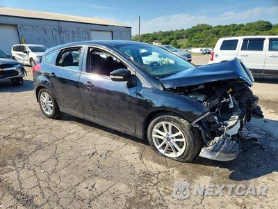 Czwarte zdjęcie samochodu z boku: 2017 FORD FOCUS SE VIN:1FADP3K28HL228471 - miniatura
