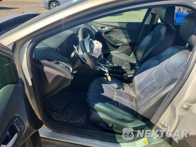 Zdjęcie 7 z 13 samochodu: 2015 FORD FOCUS TITANIUM VIN:1FADP3J25FL259143 - miniatura