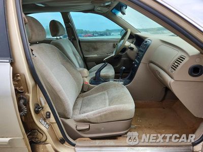Zdjęcie 7 z 12 samochodu: 2004 KIA OPTIMA LX VIN:KNAGD126445366608 - miniatura