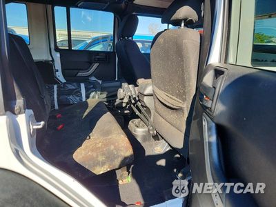 Zdjęcie 10 z 12 samochodu: 2015 JEEP WRANGLER UNLIMITED SPORT VIN:1C4BJWDG1FL590412 - miniatura