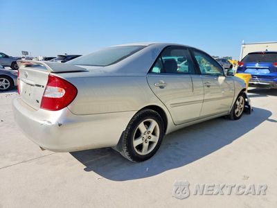 Trzecie zdjęcie samochodu z tyłu: 2002 TOYOTA CAMRY SE V6 VIN:4T1BF32K62U506267 - miniatura