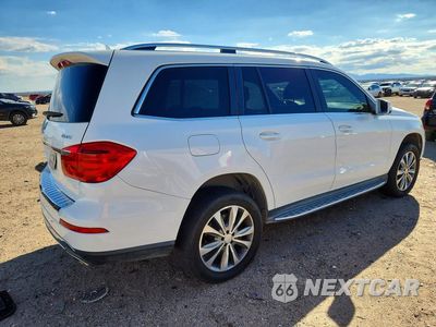 Trzecie zdjęcie samochodu z tyłu: 2015 MERCEDES-BENZ GL 450 4MATIC VIN:4JGDF6EE1FA446499 - miniatura