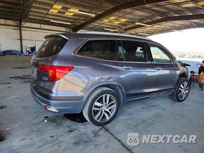 Trzecie zdjęcie samochodu z tyłu: 2018 HONDA PILOT TOURING VIN:5FNYF6H95JB034798 - miniatura