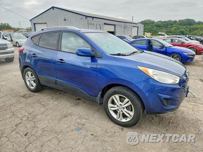 Czwarte zdjęcie samochodu z boku: 2011 HYUNDAI TUCSON GLS VIN:KM8JUCAC4BU134763 - miniatura