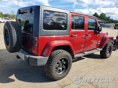 Trzecie zdjęcie samochodu z tyłu: 2012 JEEP WRANGLER UNLIMITED SAHARA VIN:1C4HJWEG0CL122868 - miniatura