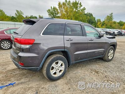 Trzecie zdjęcie samochodu z tyłu: 2014 JEEP GRAND CHEROKEE LAREDO VIN:1C4RJFAG8EC439729 - miniatura