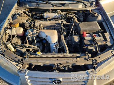 Zdjęcie 11 z 12 samochodu: 1999 TOYOTA CAMRY LE VIN:JT2BG28K9X0282678 - miniatura