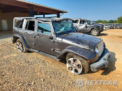 Czwarte zdjęcie samochodu z boku: 2017 JEEP WRANGLER UNLIMITED SAHARA VIN:1C4BJWEG3HL511422 - miniatura