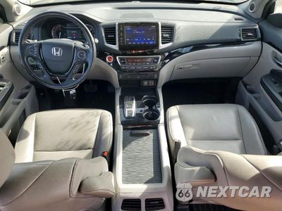 Zdjęcie 8 z 14 samochodu: 2017 HONDA PILOT TOURING VIN:5FNYF5H98HB039711 - miniatura