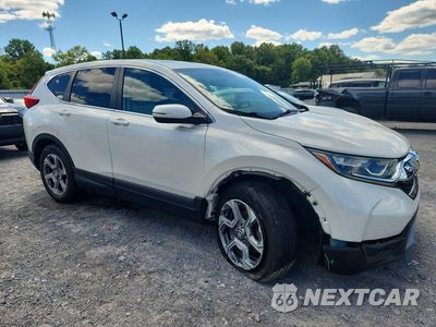 Czwarte zdjęcie samochodu z boku: 2017 HONDA CR-V EXL VIN:2HKRW2H88HH630391 - miniatura
