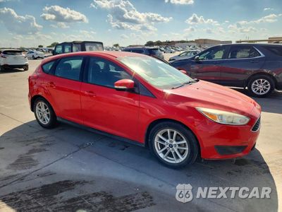 Czwarte zdjęcie samochodu z boku: 2017 FORD FOCUS SE VIN:1FADP3K22HL216395 - miniatura
