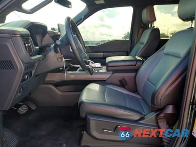 Zdjęcie 7 z 12 samochodu: 2024 FORD F150 LIGHTNING LARIAT VIN:1FT6W5L76RWG08517 - miniatura