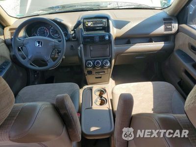 Zdjęcie 8 z 13 samochodu: 2002 HONDA CR-V LX VIN:JHLRD78492C016441 - miniatura
