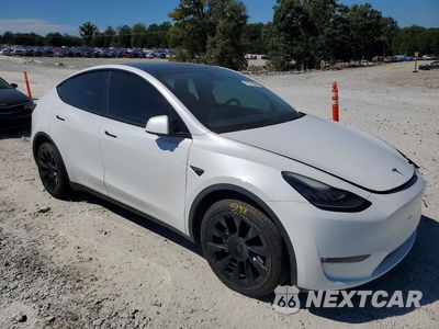 Czwarte zdjęcie samochodu z boku: 2022 TESLA MODEL Y VIN:7SAYGDEE5NF385822 - miniatura