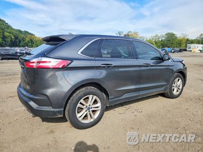 Trzecie zdjęcie samochodu z tyłu: 2019 FORD EDGE SEL VIN:2FMPK4J90KBB33867 - miniatura