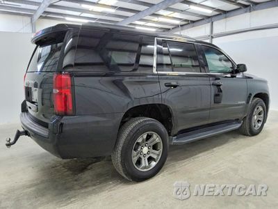 Trzecie zdjęcie samochodu z tyłu: 2019 CHEVROLET TAHOE C1500 LS VIN:1GNSCAKCXKR220751 - miniatura