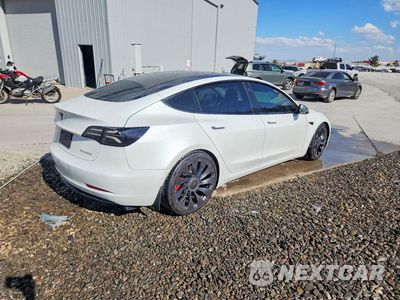 Trzecie zdjęcie samochodu z tyłu: 2022 TESLA MODEL 3 VIN:5YJ3E1EC6NF295380 - miniatura