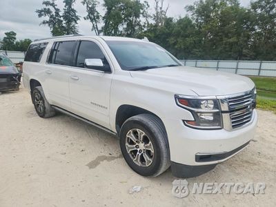 Czwarte zdjęcie samochodu z boku: 2017 CHEVROLET SUBURBAN C1500 PREMIER VIN:1GNSCJKC3HR252465 - miniatura