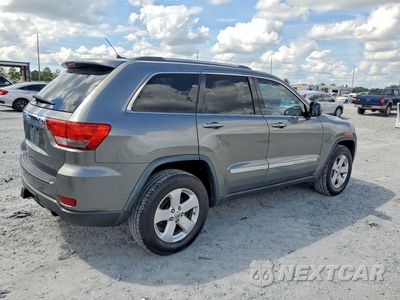 Trzecie zdjęcie samochodu z tyłu: 2013 JEEP GRAND CHEROKEE LAREDO VIN:1C4RJEAG8DC538074 - miniatura
