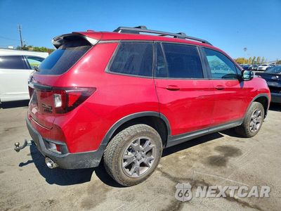Trzecie zdjęcie samochodu z tyłu: 2024 HONDA PASSPORT TRAIL SPORT VIN:5FNYF8H68RB009584 - miniatura