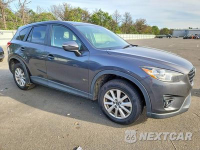 Czwarte zdjęcie samochodu z boku: 2016 MAZDA CX-5 TOURING VIN:JM3KE4CY4G0844031 - miniatura