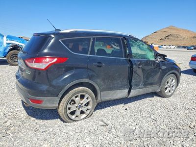 Trzecie zdjęcie samochodu z tyłu: 2016 FORD ESCAPE TITANIUM VIN:1FMCU0J91GUA55635 - miniatura