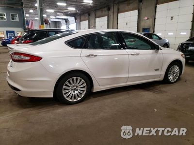 Trzecie zdjęcie samochodu z tyłu: 2014 FORD FUSION TITANIUM PHEV VIN:3FA6P0SU9ER298745 - miniatura