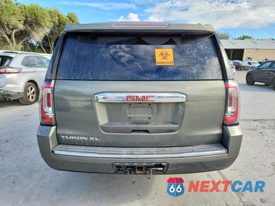 Zdjęcie 6 z 13 samochodu: 2018 GMC YUKON XL DENALI VIN:1GKS2HKJ9JR121134 - miniatura