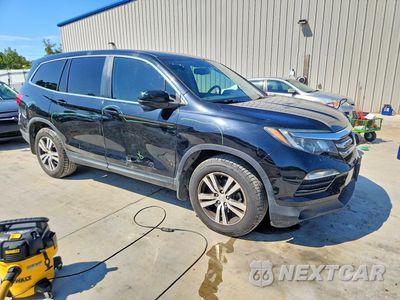 Czwarte zdjęcie samochodu z boku: 2018 HONDA PILOT EXL VIN:5FNYF6H54JB018251 - miniatura