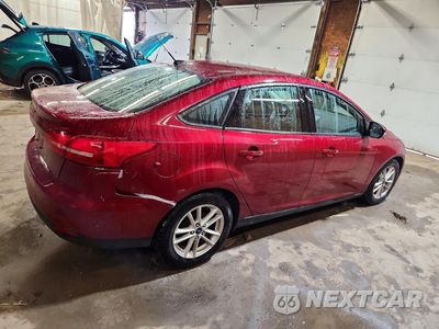Trzecie zdjęcie samochodu z tyłu: 2016 FORD FOCUS SE VIN:1FADP3F23GL220299 - miniatura