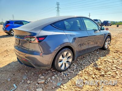 Trzecie zdjęcie samochodu z tyłu: 2023 TESLA MODEL Y VIN:7SAYGDEE2PA140346 - miniatura