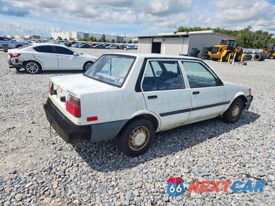 Trzecie zdjęcie samochodu z tyłu: 1987 TOYOTA COROLLA DELUXE VIN:JT2AE82E2H3542569 - miniatura