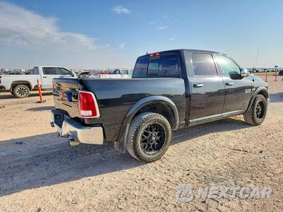 Trzecie zdjęcie samochodu z tyłu: 2015 RAM 1500 LARAMIE VIN:1C6RR7NT0FS759731 - miniatura
