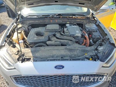 Zdjęcie 11 z 13 samochodu: 2019 FORD FUSION TITANIUM VIN:3FA6P0RU2KR241837 - miniatura