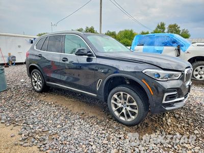 Czwarte zdjęcie samochodu z boku: 2023 BMW X5 XDRIVE45E VIN:5UXTA6C01P9R10866 - miniatura