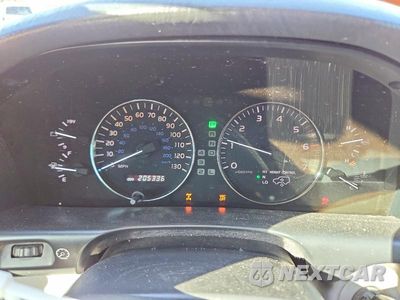 Zdjęcie 9 z 12 samochodu: 2004 LEXUS LX 470 VIN:JTJHT00W143542093 - miniatura