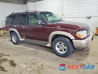Czwarte zdjęcie samochodu z boku: 2000 FORD EXPLORER EDDIE BAUER VIN:1FMZU74EXYZA88732 - miniatura