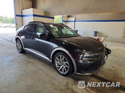 Czwarte zdjęcie samochodu z boku: 2023 GENESIS GV60 ADVANCED VIN:KMUKCDTC6PU018273 - miniatura