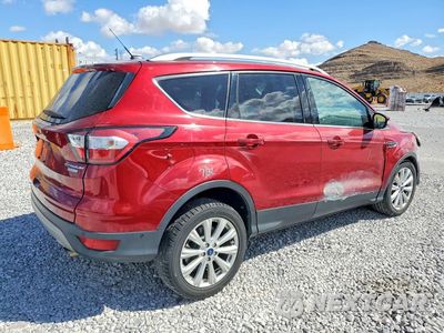 Trzecie zdjęcie samochodu z tyłu: 2017 FORD ESCAPE TITANIUM VIN:1FMCU0JD9HUC51120 - miniatura
