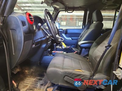 Zdjęcie 7 z 12 samochodu: 2012 JEEP WRANGLER UNLIMITED SAHARA VIN:1C4BJWEG9CL134538 - miniatura
