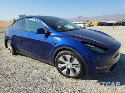 Czwarte zdjęcie samochodu z boku: 2023 TESLA MODEL Y VIN:7SAYGAEE4PF615495 - miniatura
