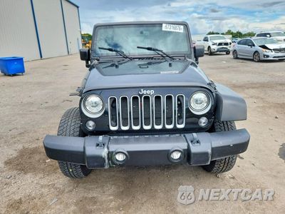 Piąte zdjęcie samochodu w środku: 2017 JEEP WRANGLER UNLIMITED SAHARA VIN:1C4BJWEG6HL627536 - miniatura