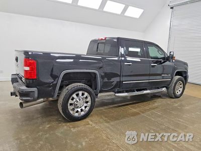Trzecie zdjęcie samochodu z tyłu: 2019 GMC SIERRA K2500 DENALI VIN:1GT12SEY6KF215147 - miniatura