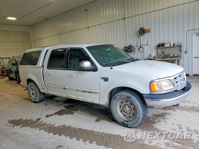 Czwarte zdjęcie samochodu z boku: 2002 FORD F150 SUPERCREW VIN:1FTRW07LX2KB58603 - miniatura