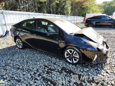 Czwarte zdjęcie samochodu z boku: 2017 TOYOTA PRIUS FOUR TOURING VIN:JTDKARFU1H3031269 - miniatura