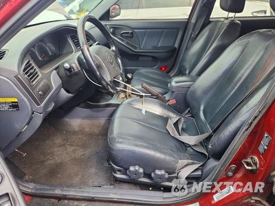 Zdjęcie 7 z 12 samochodu: 2002 HYUNDAI ELANTRA GT VIN:KMHDN55D22U052166 - miniatura