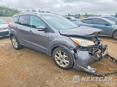 Czwarte zdjęcie samochodu z boku: 2014 FORD ESCAPE TITANIUM VIN:1FMCU0J90EUC42684 - miniatura