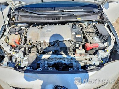 Zdjęcie 11 z 13 samochodu: 2017 TOYOTA PRIUS THREE TOURING VIN:JTDKARFU0H3048063 - miniatura