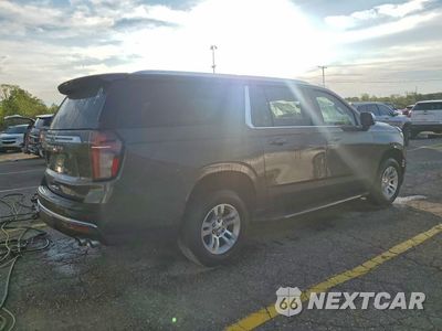 Trzecie zdjęcie samochodu z tyłu: 2021 CHEVROLET SUBURBAN K1500 PREMIER VIN:1GNSKFKD9MR164443 - miniatura